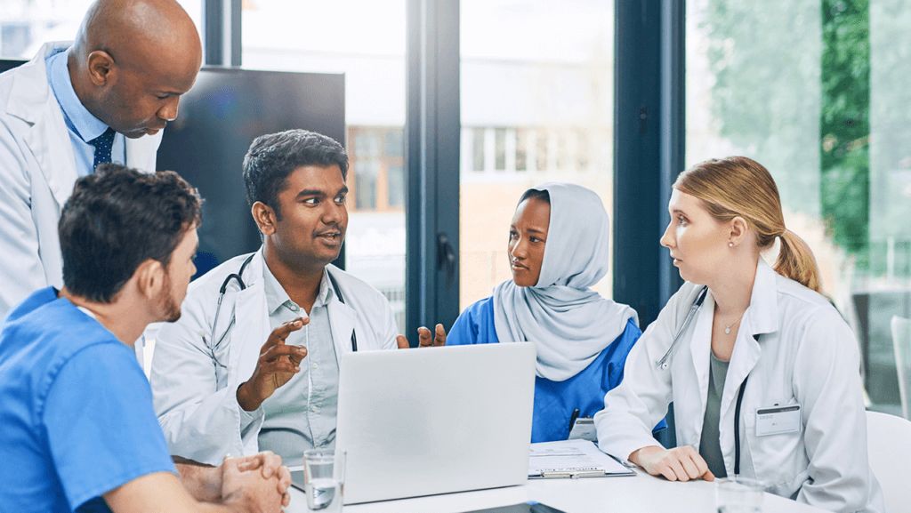 Diverse group of professionals engaged in an interpreting session