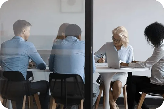 Legal team meeting around a table – legal interpreting and translation
